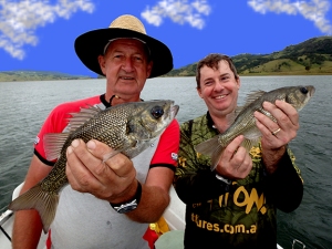 Bill & Bruce both hooked up with nice Australian bass while trolling through a school of bass near shore in a small cove on Lake St. Clair in New South Wales Australia.